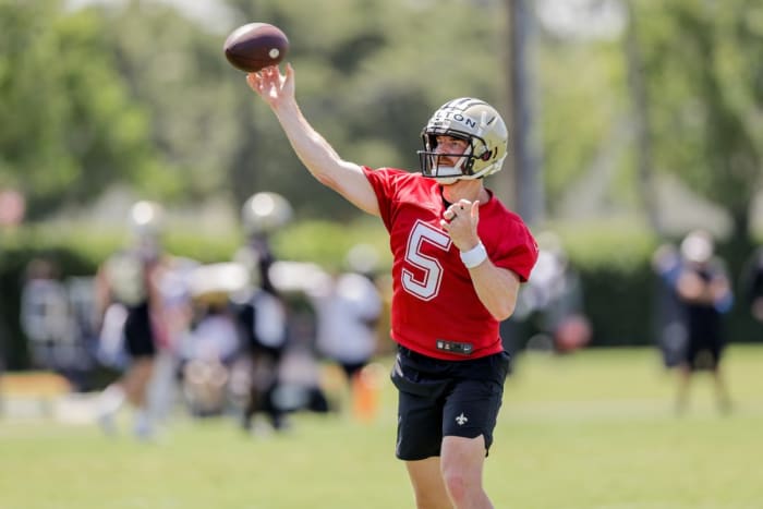 New Orleans Saints Andy Dalton (5) works on passing drills during organized team activities at the Saints Training Facility. Mandatory Credit: Stephen Lew-USA TODAY Sports